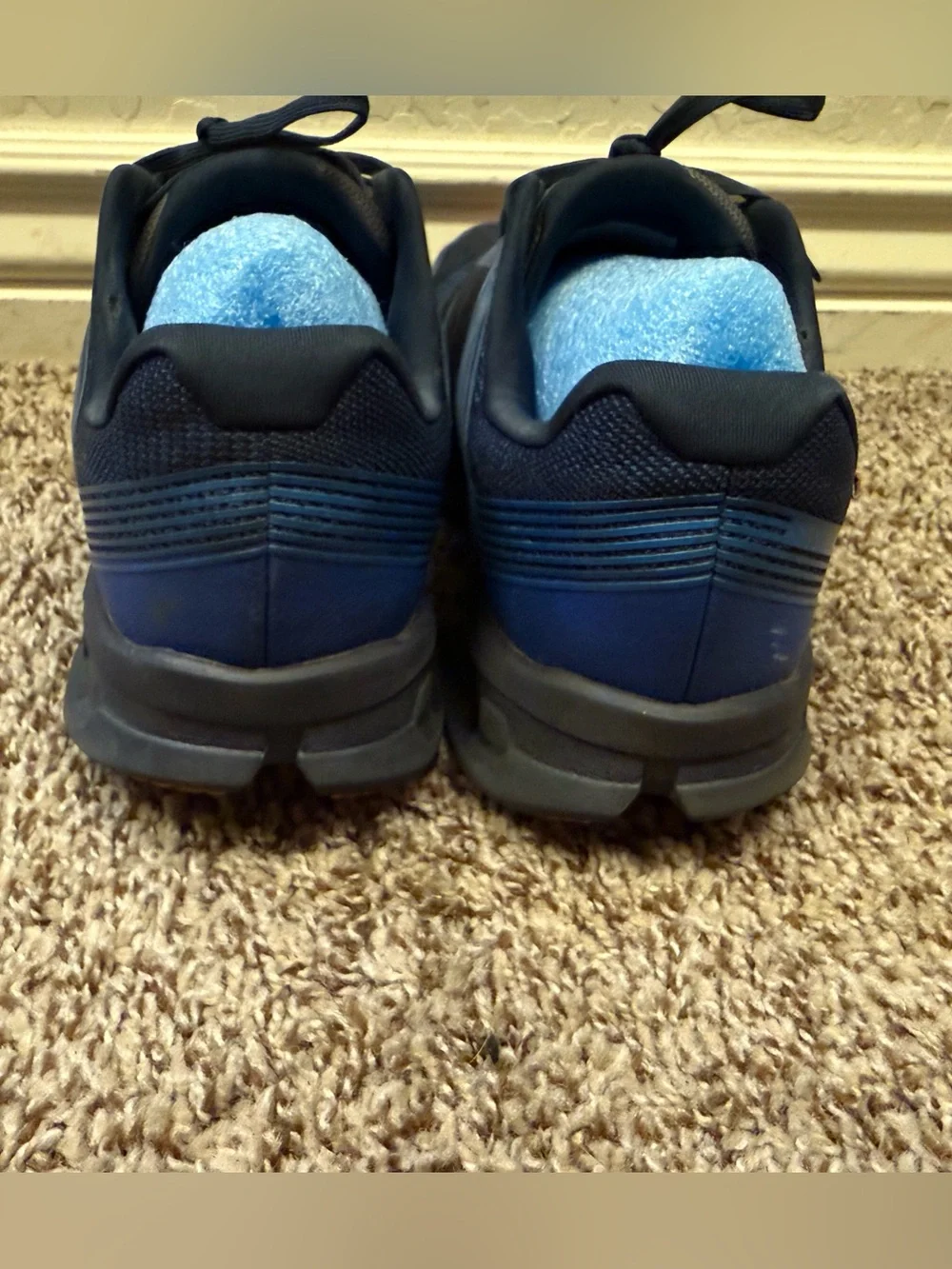 On Running Men’s Navy and Black Cloudtec Trainer with Orange Accents